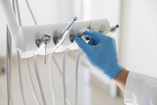 Professional Tooth Extraction technician working in Little Rock, AR